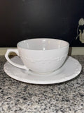 Gibson Everyday white embossed teacup and saucer set, side view