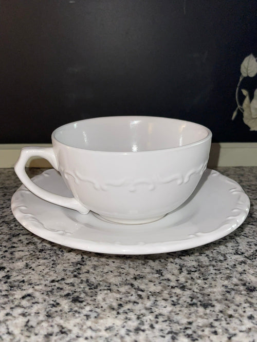 Gibson Everyday white embossed teacup and saucer set, side view