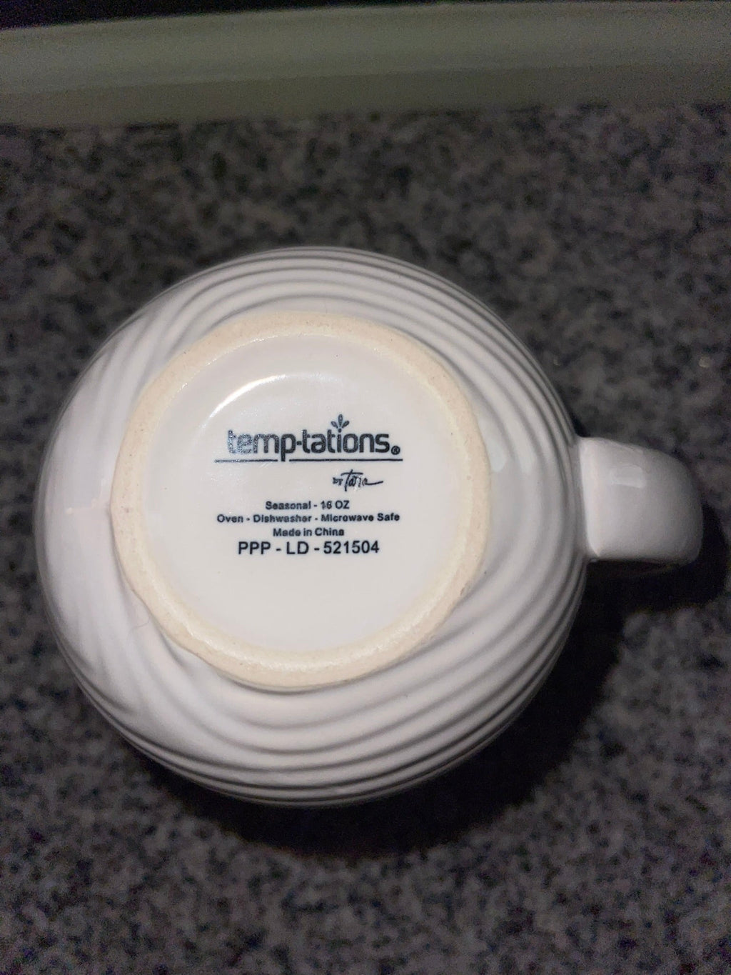 Bottom of Temp-tations mug showing Seasonal 16 oz oven dishwasher microwave safe backstamp