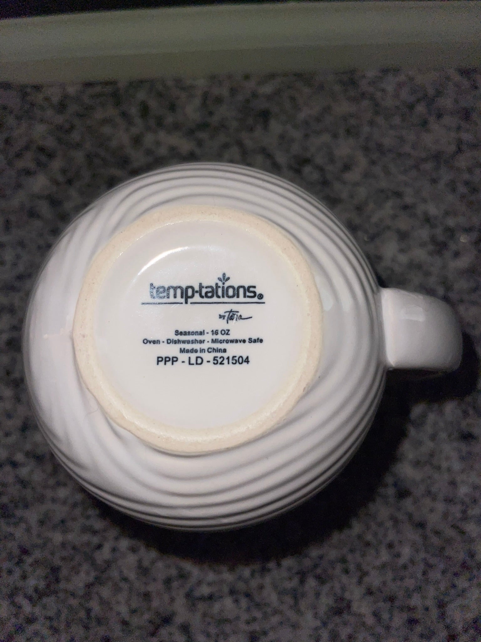 Bottom of Temp-tations mug showing Seasonal 16 oz oven dishwasher microwave safe backstamp