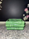 Vintage green bamboo ceramic planter, front view showing raised bamboo relief and jade glaze