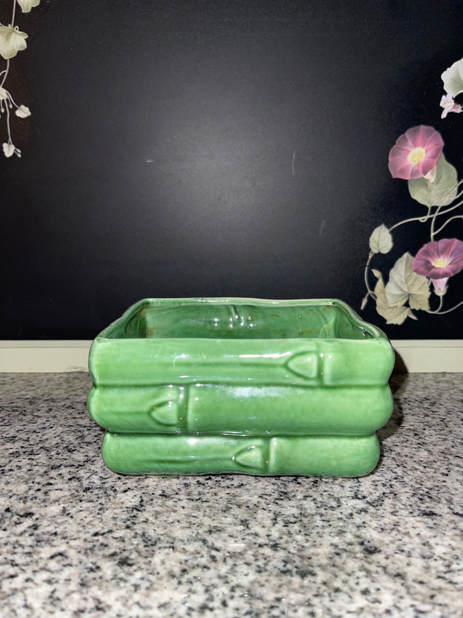 Vintage green bamboo ceramic planter, front view showing raised bamboo relief and jade glaze