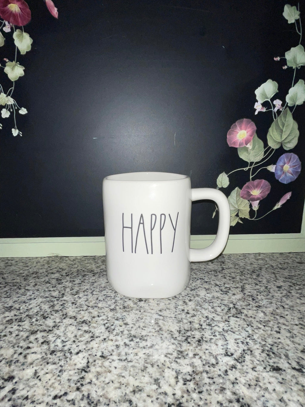 Rae Dunn HAPPY mug front view showing elongated font on white ceramic