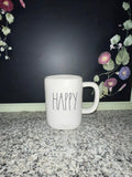 Rae Dunn HAPPY mug front view showing elongated font on white ceramic