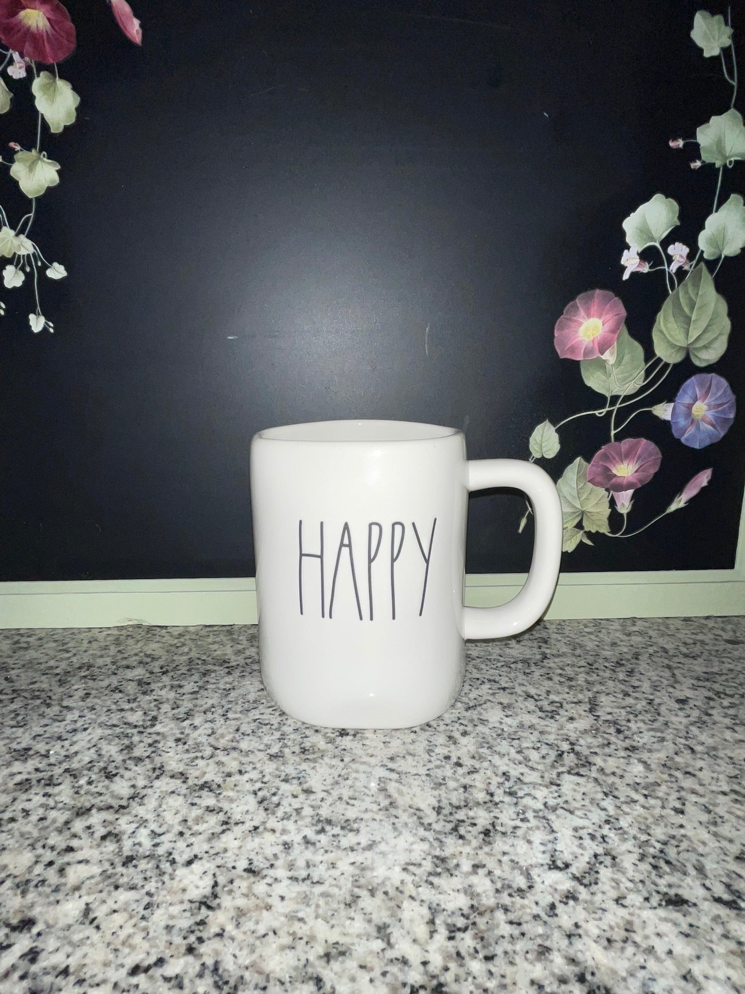 Rae Dunn HAPPY mug front view showing elongated font on white ceramic