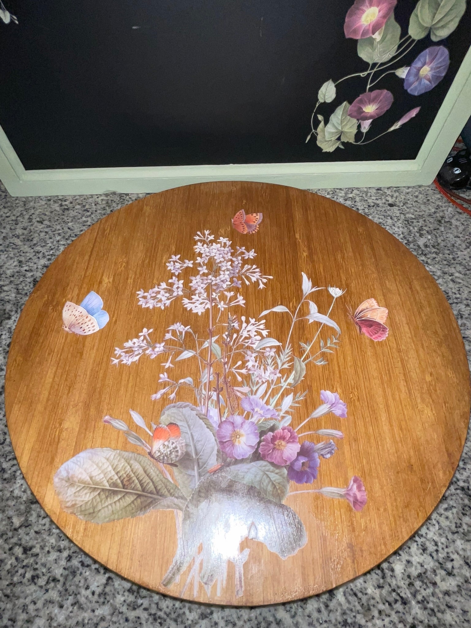 Vintage bamboo lazy Susan angled view showing full botanical decoupage scene
