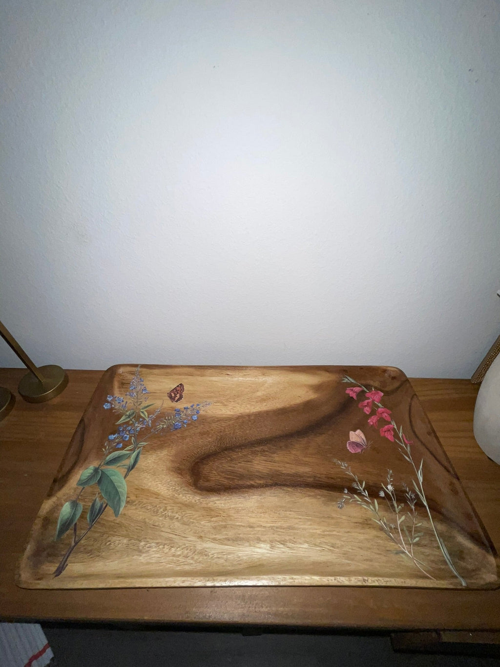 Vintage wood botanical tray on dresser, top-down angled view showing full decoupage scene