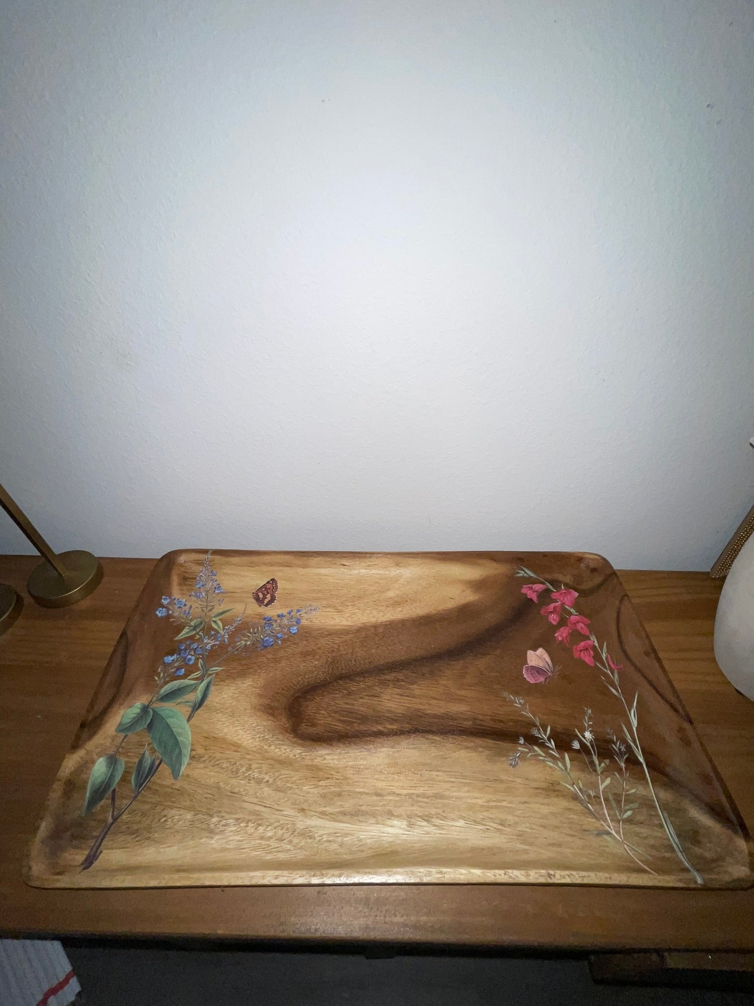 Vintage wood botanical tray on dresser, top-down angled view showing full decoupage scene