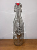 Paris 1881 Fleurs de Prairies swing-top glass bottle front view with hummingbird