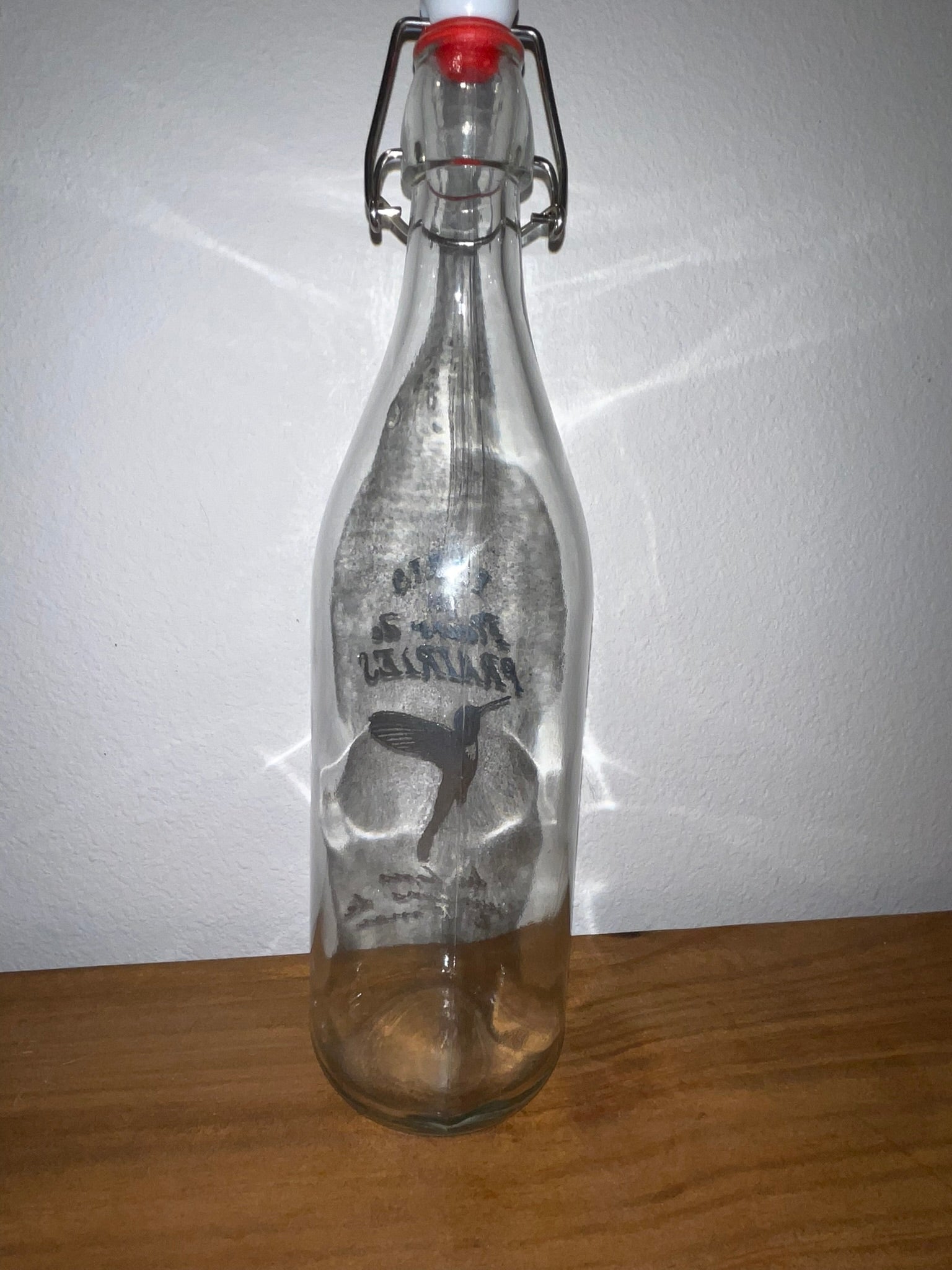 Paris 1881 Fleurs de Prairies swing-top glass bottle back view