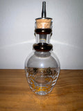 Vintage glass cruet decanter showing gold gilt etched floral motif side