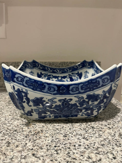 Chinese blue and white square porcelain bowl side view showing lotus scroll motif