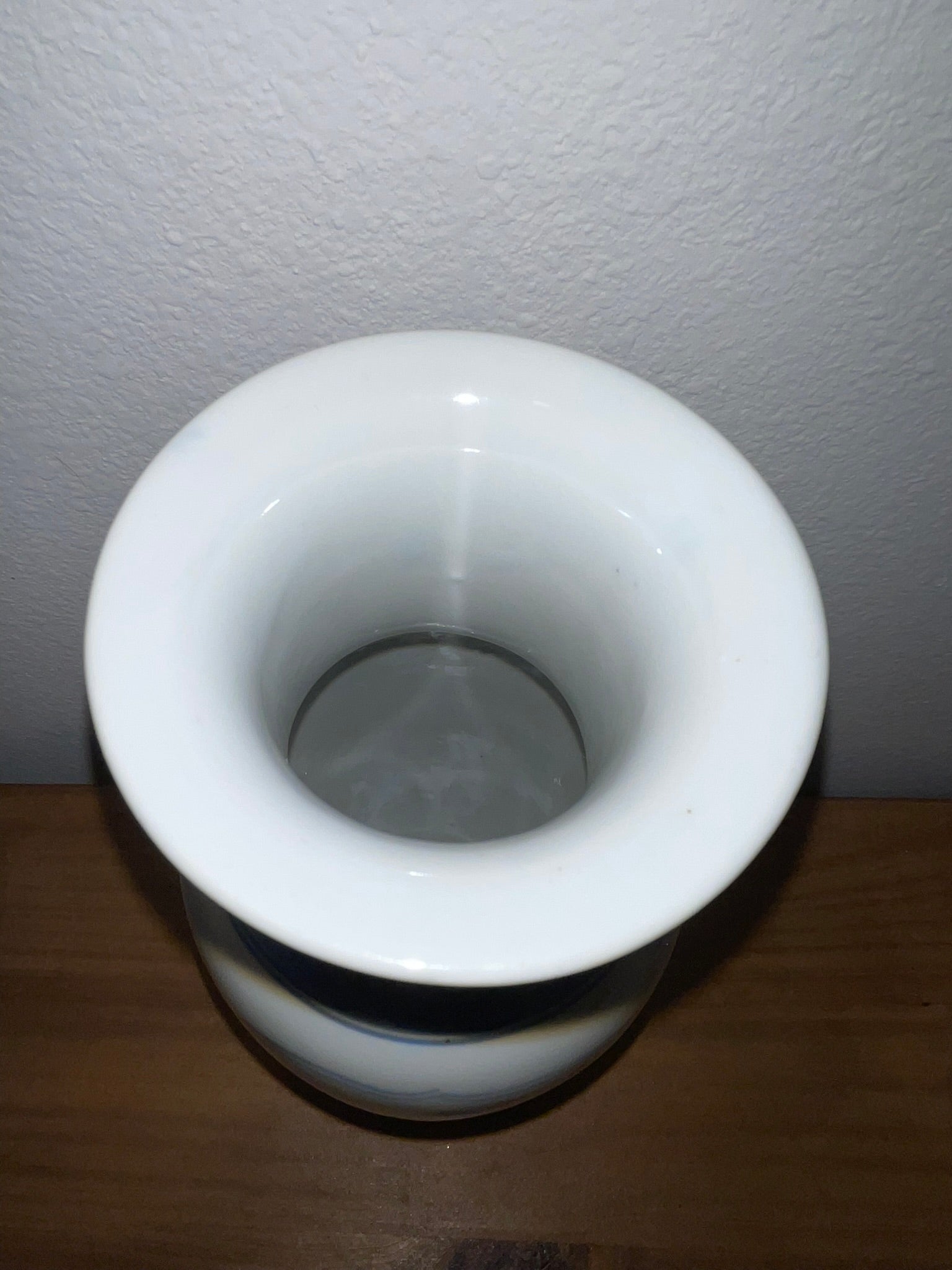 Chinese blue and white porcelain vase side view showing floral detail